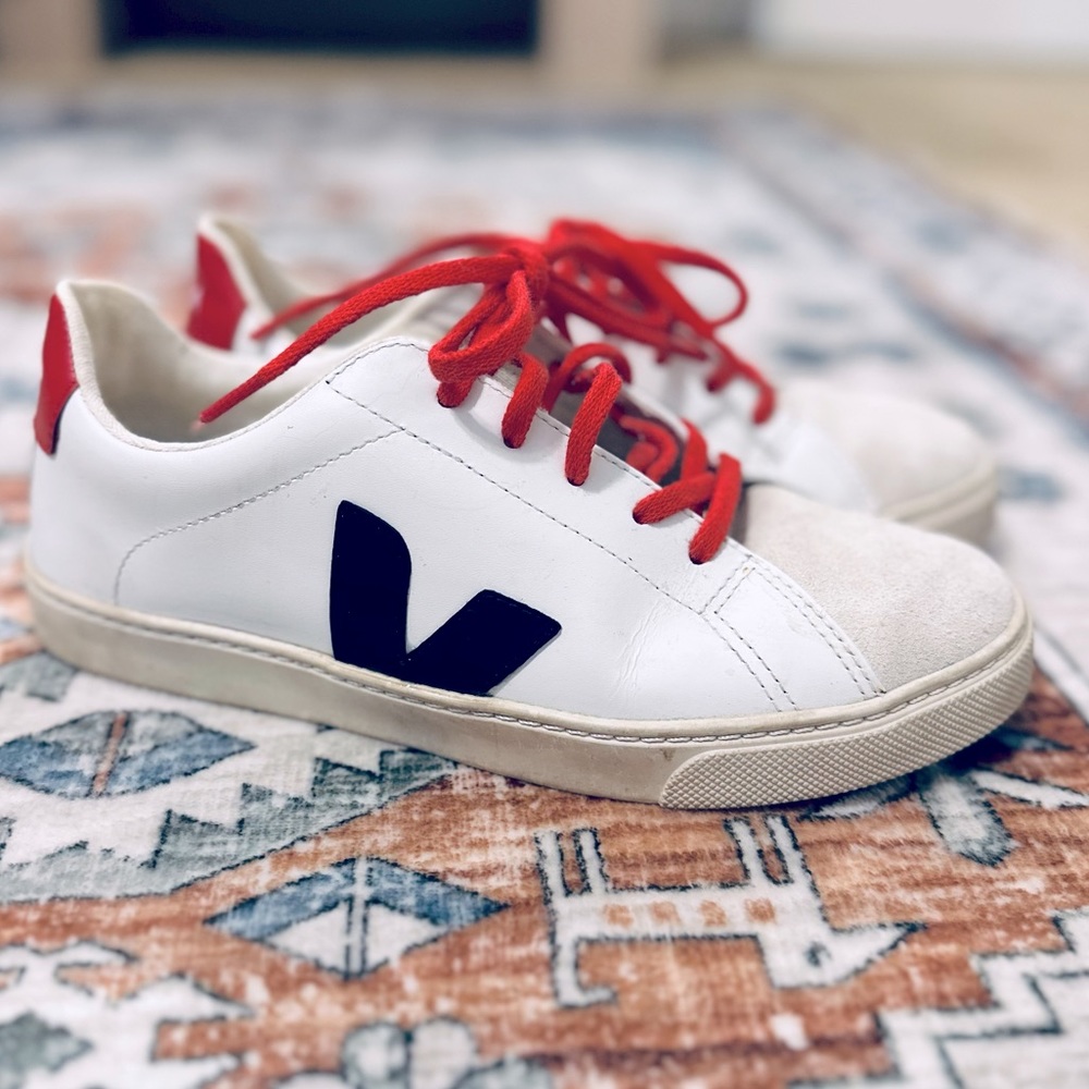 VEJA classic white sneakers with a pop of red!